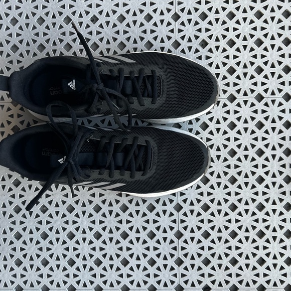 Men running shoes and dress shoes and women running shoes as well. - Picture 3 of 10